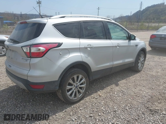 2017 Ford Escape Titanium with VIN 1FMCU9JD0HUE42509, listed as a IAAI auction lot 42079984 with 1 mi miles. Bid and sale history available at carsss.com. Image 4.