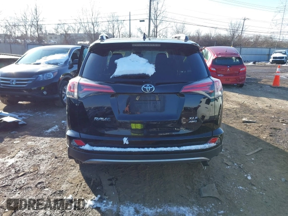 2018 Toyota RAV4 XLE with VIN 2T3RFREV1JW808773, listed as a IAAI auction lot 41595377 with 109,309 mi miles. Bid and sale history available at carsss.com. Image 17.