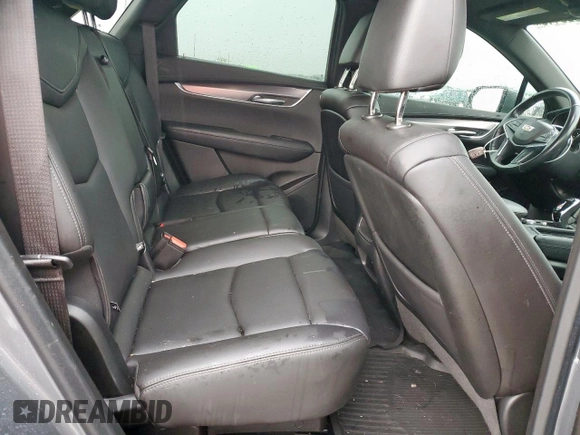 2022 Cadillac XT5 FWD Luxury z VIN 1GYKNAR47NZ116377, wystawiony jako Copart lot #55828415 z przebiegiem 62 276 mil mil oraz Czysty tytuł • Clean title. Historia ofert i sprzedaży dostępna na DreamBid. Obrazek 10.