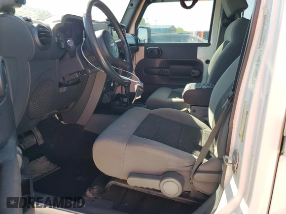 2008 Jeep Wrangler Unlimited X with VIN 1J4GB39128L576571, listed as a Copart auction lot 52706105 with 197,655 mi miles and Clean Title. Bid and sale history available at DreamBid. Image 7.