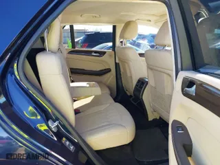 2016 Mercedes-Benz GLE with VIN 4JGDA5HB0GA719802, listed as a IAAI auction lot 41595294 with 112,527 mi miles. Bid and sale history available at carsss.com. Image 8.
