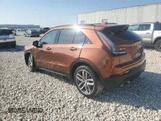 2021 Cadillac XT4 AWD Sport with VIN 1GYFZFR49MF042933, listed as a Copart auction lot 44150315 with 21,926 mi miles and Salvage title. Bid and sale history available at DreamBid. Image 2.