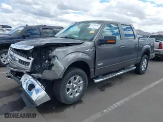 2013 Ford F-150 XL with VIN 1FTFW1ET1DKE23813, listed as a IAAI auction lot 41784232 with 140,886 mi miles. Bid and sale history available at carsss.com. Image 2.