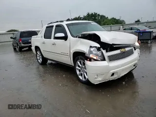 2013 Chevrolet Avalanche LTZ with VIN 3GNMCGE0XDG334846, listed as a Copart auction lot 55261885 with 118,704 mi miles and Salvage title. Bid and sale history available at DreamBid. Image 13.