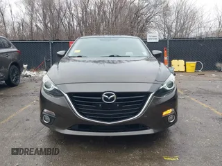 2014 Mazda 3 S Touring with VIN JM1BM1V31E1111499, listed as a IAAI auction lot 41476457 with 109,337 mi miles and . Bid and sale history available at DreamBid. Image 12.