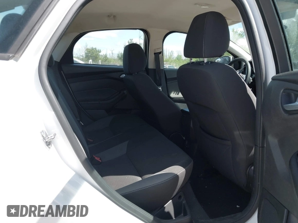 2013 Ford Focus SE with VIN 1FADP3F23DL218239, listed as a IAAI auction lot 42331440 with 156,501 mi miles and . Bid and sale history available at DreamBid. Image 8.