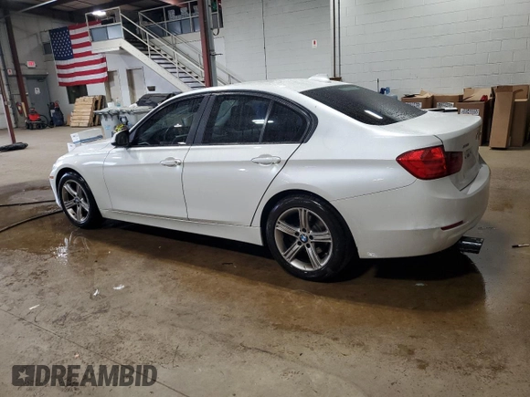 2013 BMW 3 Series 320i xDrive with VIN WBA3C3C5XDF982732, listed as a Copart auction lot 62852385 with 134,466 mi miles and Salvage title. Bid and sale history available at DreamBid. Image 2.