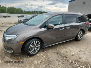 2022 Honda Odyssey Touring with VIN 5FNRL6H89NB020462, listed as a Copart auction lot 65296455 with 52,058 mi miles and Salvage title. Bid and sale history available at DreamBid. Image 1.