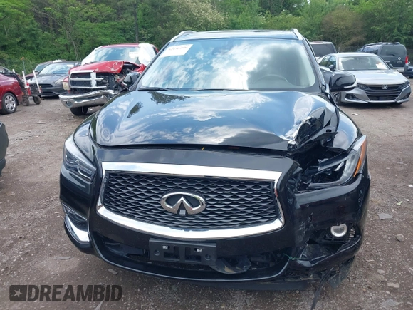 2020 Infiniti QX60 LUXE with VIN 5N1DL0MM8LC516594, listed as a IAAI auction lot 42136299 with 92,747 mi miles. Bid and sale history available at carsss.com. Image 6.