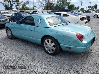 2002 Ford Thunderbird Hardtop Premium z VIN 1FAHP60A72Y104943, wystawiony jako Copart lot #56905825 z przebiegiem 138 244 mil mil oraz Szkoda całkowita • Salvage title. Historia ofert i sprzedaży dostępna na DreamBid. Obrazek 2.