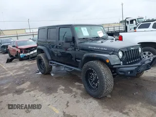 2017 Jeep Wrangler Unlimited Rubicon Recon z VIN 1C4HJWFG9HL592824, wystawiony jako IAAI lot #41427433 z przebiegiem 70 105 mil mil oraz . Historia ofert i sprzedaży dostępna na DreamBid. Obrazek 1.