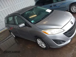 2012 Mazda 5 Sport with VIN JM1CW2BL0C0105611, listed as a IAAI auction lot 42738239 with 268,507 mi miles and . Bid and sale history available at DreamBid. Image 1.