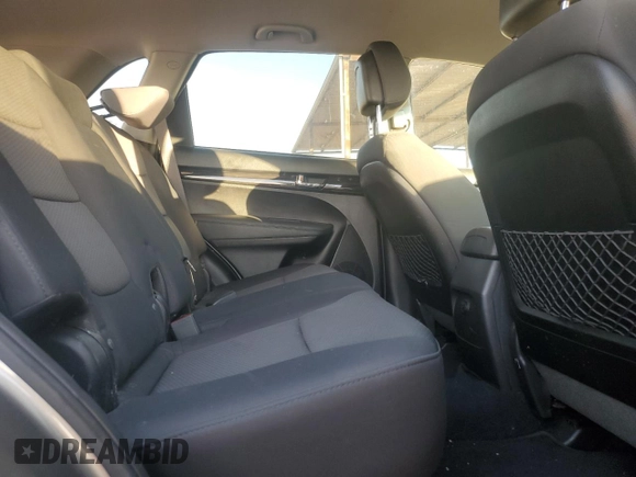 2012 Kia Sorento LX with VIN 5XYKTCA62CG255185, listed as a Copart auction lot 87242304 with 124,224 mi miles and Salvage Title. Bid and sale history available at DreamBid. Image 11.