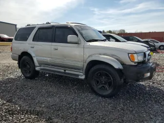 1999 Toyota 4Runner Limited with VIN JT3GN87R5X0115971, listed as a Copart auction lot 50742105 with 323,635 mi miles and Salvage Title. Bid and sale history available at DreamBid. Image 4.