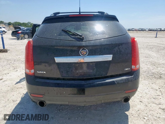 2012 Cadillac SRX Performance Collection with VIN 3GYFNBE34CS609643, listed as a Copart auction lot 57223065 with 182,072 mi miles and Salvage title. Bid and sale history available at DreamBid. Image 6.