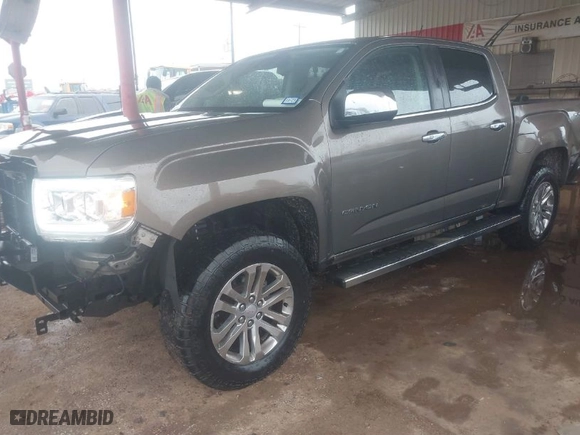 2016 GMC Canyon 4WD SLT with VIN 1GTG6DE35G1100042, listed as a IAAI auction lot 41387193 with 198,004 mi miles. Bid and sale history available at carsss.com. Image 2.
