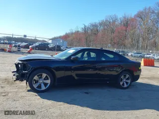 2016 Dodge Charger SXT with VIN 2C3CDXHG4GH196708, listed as a IAAI auction lot 41892104 with 142,765 mi miles. Bid and sale history available at carsss.com. Image 14.