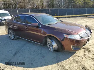 2012 Lincoln MKS with VIN 1LNHL9ER2CG802577, listed as a Copart auction lot 85455164 with 121,169 mi miles and Salvage Title. Bid and sale history available at DreamBid. Image 4.