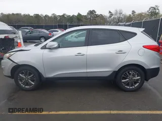 2015 Hyundai Tucson GLS with VIN KM8JT3AF3FU959938, listed as a IAAI auction lot 41828886 with 83,612 mi miles and . Bid and sale history available at DreamBid. Image 14.