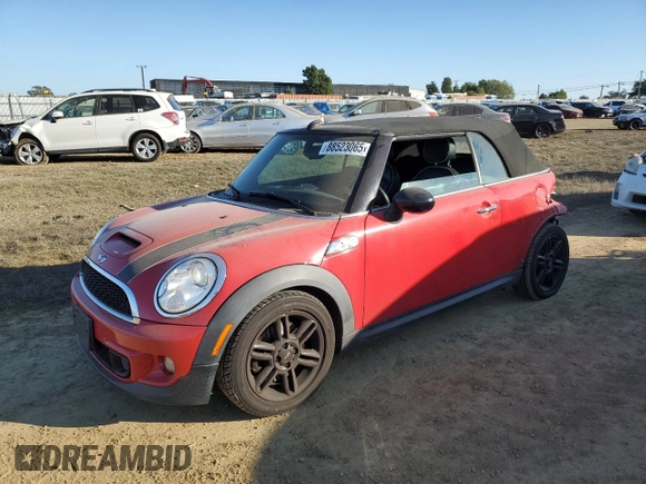 2014 MINI Convertible S with VIN WMWZP3C54ET298129, listed as a Copart auction lot 88523065 with 54,788 mi miles and Salvage title. Bid and sale history available at DreamBid. Image 1.