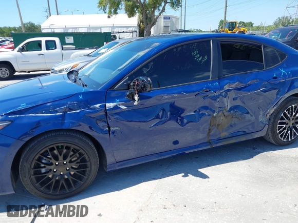 2025 Toyota Camry LE with VIN 4T1DAACK3SU104152, listed as a IAAI auction lot 42039337 with 1,423 mi miles and . Bid and sale history available at DreamBid. Image 6.