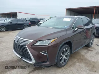 2016 Lexus RX 350 z VIN 2T2ZZMCA5GC029529, wystawiony jako IAAI lot #41953567 z przebiegiem 133 460 mil mil oraz . Historia ofert i sprzedaży dostępna na DreamBid. Obrazek 2.