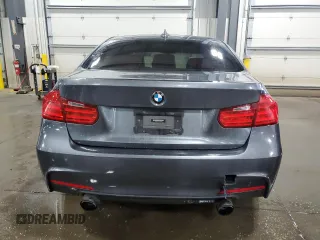 2014 BMW 3 Series 335i xDrive with VIN WBA3B9C59EP458568, listed as a Copart auction lot 61133085 with 177,009 mi miles and Salvage title. Bid and sale history available at DreamBid. Image 6.