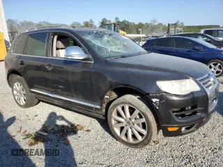 2010 Volkswagen Touareg VR6 with VIN WVGBF7A92AD002237, listed as a Copart auction lot 73919754 with 124,072 mi miles and Salvage Title. Bid and sale history available at DreamBid. Image 4.