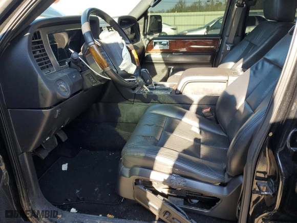 2012 Lincoln Navigator with VIN 5LMJJ2H55CEL07466, listed as a Copart auction lot 87793555 with 213,802 mi miles and Salvage Title. Bid and sale history available at carsss.com. Image 7.