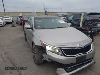 2014 Kia Optima SX Turbo with VIN 5XXGR4A67EG310442, listed as a IAAI auction lot 41380687 with 125,027 mi miles and . Bid and sale history available at DreamBid. Image 1.