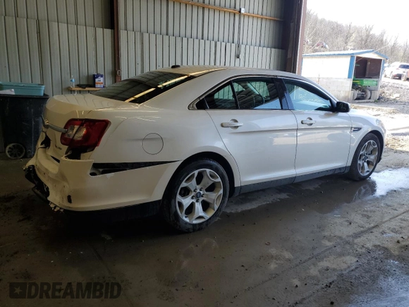 2012 Ford Taurus SEL z VIN 1FAHP2HW8CG133657, wystawiony jako Copart lot #52865895 z przebiegiem 132 876 mil mil oraz Szkoda całkowita • Salvage title. Historia ofert i sprzedaży dostępna na DreamBid. Obrazek 3.