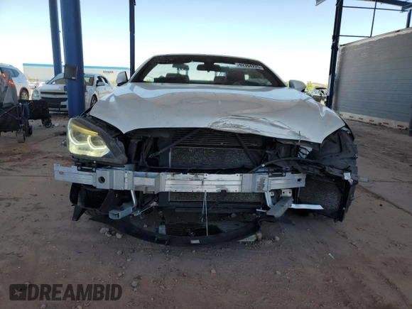 2013 BMW M6 с VIN WBSLZ9C59DDZ77823, выставлен на аукционе Copart как лот 62354225 с пробегом 74 704 миль миль и Списание • Salvage title. История ставок и продаж доступна на DreamBid. Изображение 5.
