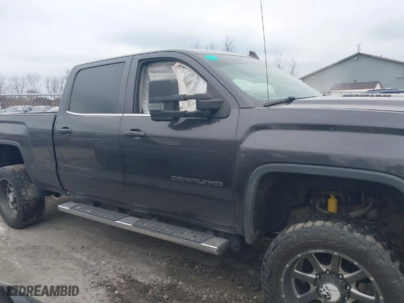 2015 GMC Sierra 2500HD available WiFi Denali with VIN 1GT120E84FF681816, listed as a IAAI auction lot 40967677 with NaN miles. Bid and sale history available at carsss.com. Image 13.
