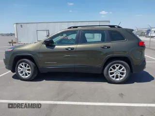 2015 Jeep Cherokee Sport with VIN 1C4PJMAB9FW595102, listed as a IAAI auction lot 42257918 with 95,059 mi miles and . Bid and sale history available at DreamBid. Image 14.