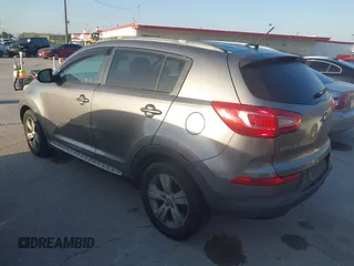 2013 Kia Sportage LX with VIN KNDPB3A26D7406680, listed as a IAAI auction lot 42004413 with 170,221 mi miles and . Bid and sale history available at carsss.com. Image 3.