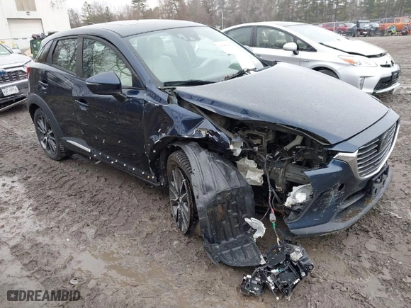 2017 Mazda CX-3 Grand Touring with VIN JM1DKFD75H0179167, listed as a IAAI auction lot 41980243 with 69,076 mi miles. Bid and sale history available at carsss.com. Image 1.