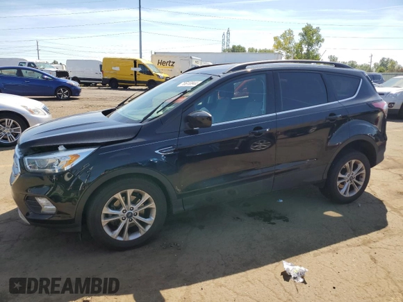 2017 Ford Escape SE z VIN 1FMCU0GD5HUD52467, wystawiony jako Copart lot #70616944 z przebiegiem 115 876 mil mil oraz Szkoda całkowita • Salvage title. Historia ofert i sprzedaży dostępna na DreamBid. Obrazek 1.