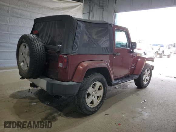 2010 Jeep Wrangler Sahara z VIN 1J4GA5D11AL106768, wystawiony jako Copart lot #56935745 z przebiegiem 143 212 mil mil oraz Szkoda całkowita • Salvage title. Historia ofert i sprzedaży dostępna na DreamBid. Obrazek 3.