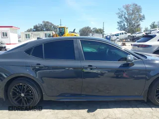 2025 Toyota Camry LE with VIN 4T1DAACK9SU070427, listed as a IAAI auction lot 41814689 with 2,934 mi miles and . Bid and sale history available at DreamBid. Image 13.