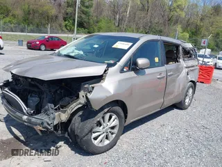 2017 Kia Sedona LX with VIN KNDMB5C14H6233059, listed as a IAAI auction lot 42006480 with 109,748 mi miles. Bid and sale history available at carsss.com. Image 2.