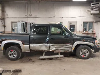 2004 GMC Sierra 1500 Crew Cab SLE with VIN 2GTEK13T741338064, listed as a IAAI auction lot 41497968 with 198,869 mi miles. Bid and sale history available at carsss.com. Image 14.