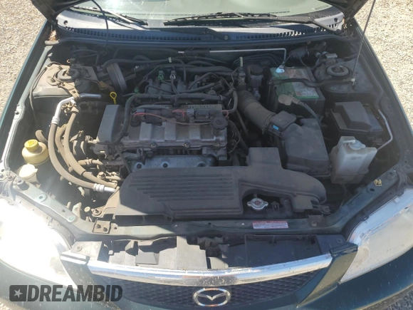 2002 Mazda Protege DX with VIN JM1BJ225121567924, listed as a Copart auction lot 54847545 with 93,653 mi miles and Salvage Title. Bid and sale history available at DreamBid. Image 11.