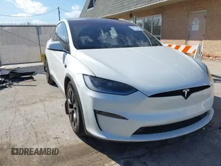 2023 Tesla Model X Plaid with VIN 7SAXCBE63PF405105, listed as a IAAI auction lot 41876918 with 22,475 mi miles and . Bid and sale history available at DreamBid. Image 1.