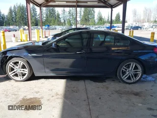 2014 BMW 6 Series 640i xDrive with VIN WBA6B8C5XED452416, listed as a IAAI auction lot 41851885 with 111,445 mi miles and . Bid and sale history available at carsss.com. Image 14.