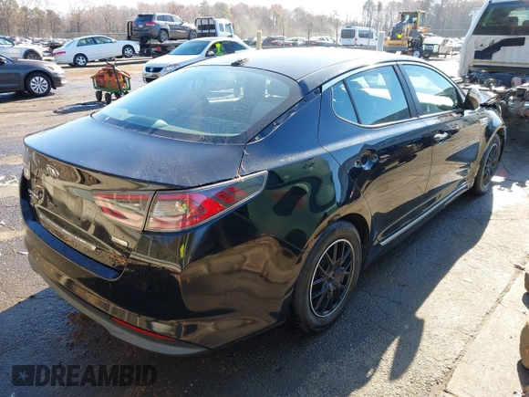 2015 Kia Optima Hybrid with VIN KNAGM4AD3F5088949, listed as a IAAI auction lot 41008816 with 138,921 mi miles. Bid and sale history available at carsss.com. Image 4.