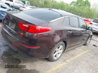 2015 Kia Optima LX with VIN 5XXGM4A79FG494002, listed as a IAAI auction lot 42082041 with 179,076 mi miles. Bid and sale history available at carsss.com. Image 4.
