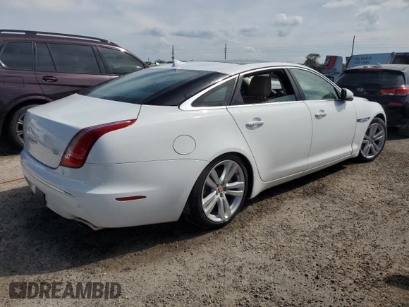 2014 Jaguar XJ Portfolio with VIN SAJWJ2GD6E8V74284, listed as a Copart auction lot 74577584 with 39,835 mi miles and Non repairable. Bid and sale history available at DreamBid. Image 3.