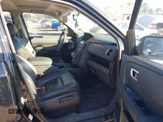2013 Honda Pilot Touring with VIN 5FNYF4H9XDB047796, listed as a IAAI auction lot 41591189 with 188,579 mi miles and . Bid and sale history available at carsss.com. Image 5.