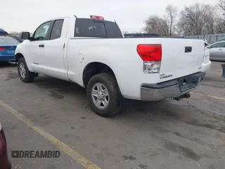 2012 Toyota Tundra z VIN 5TFUM5F11CX039386, wystawiony jako IAAI lot #41472576 z przebiegiem 213 295 mil mil oraz . Historia ofert i sprzedaży dostępna na DreamBid. Obrazek 3.