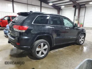 2014 Jeep Grand Cherokee Overland with VIN 1C4RJFCT9EC264594, listed as a Copart auction lot 50071695 with 124,712 mi miles and Clean Title. Bid and sale history available at DreamBid. Image 3.